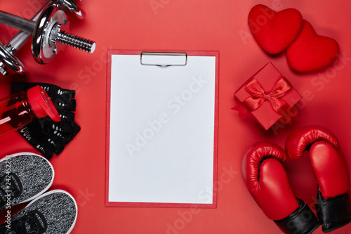 Sport equipment and red hearts. Fitness.