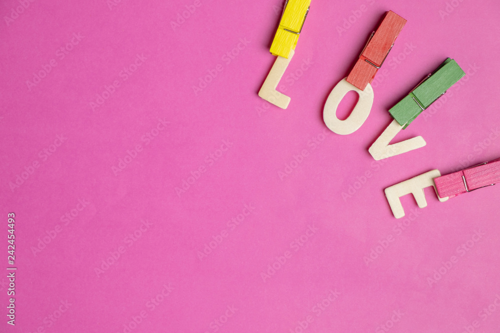 word LOVE in red hearts on pink background, Love icon, valentine's day, relationships concept with copy space word LOVE in red hearts on pink background, Love icon, valentine's day, relationships concept with copy space