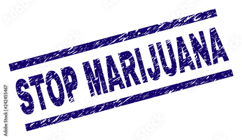 STOP MARIJUANA seal print with scratced style. Blue vector rubber print of STOP MARIJUANA title with scratched texture. Text label is placed between parallel lines.