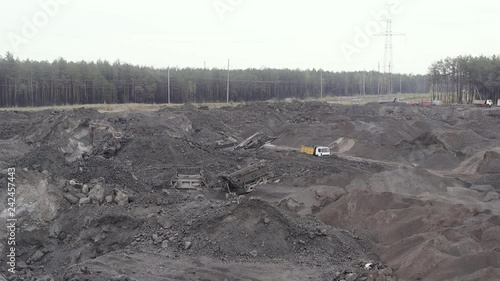 A large truck full of waste goes to the quarry. Lucky waste (metal) for recycling.