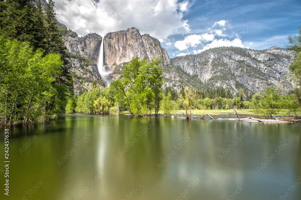 Yosemite Falls in Yosemite National Park with Reflection on the River