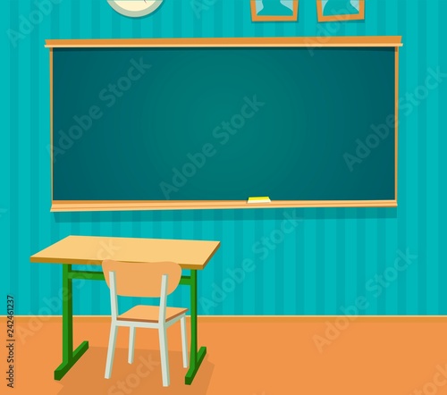 Interior of classroom with desk and blackboard.