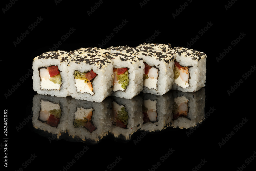 various sushi, rolls on a black background with reflection. especially for cafes and restaurants various sushi, rolls on a black background with reflection. especially for cafes and restaurants