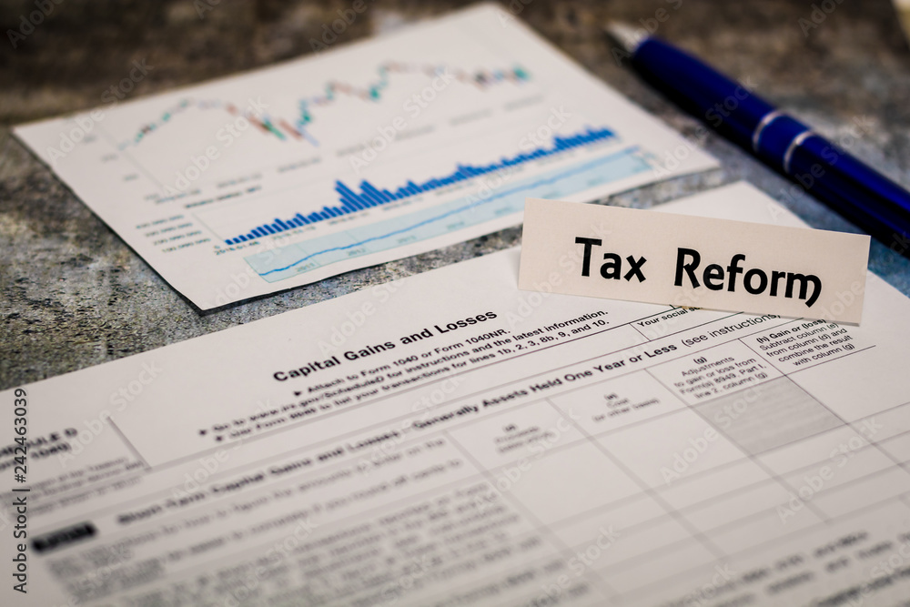 Tax still life business finance concept, form 1099, Dividends and Distributions Tax still life business finance concept, form 1099, Dividends and Distributions