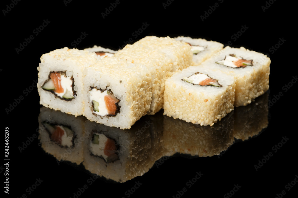 various sushi, rolls on a black background with reflection. especially for cafes and restaurants various sushi, rolls on a black background with reflection. especially for cafes and restaurants