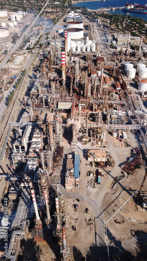 Aerial drone photo of working industrial oil refinery and power plant