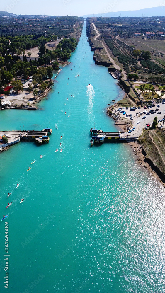 Aerial bird's eye view photo taken by drone of stand up paddle surfing or SUP competition in Corinth Canal of Isthmos or Isthmus, Peloponnese, Greece