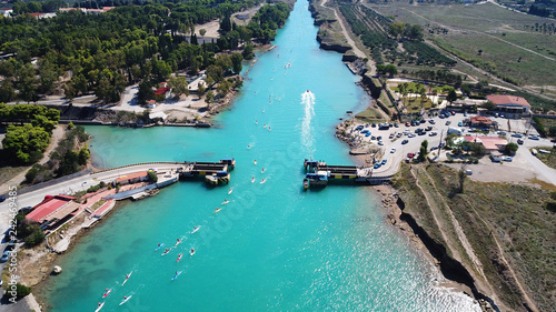 Aerial bird's eye view photo taken by drone of stand up paddle surfing or SUP competition in Corinth Canal of Isthmos or Isthmus, Peloponnese, Greece
