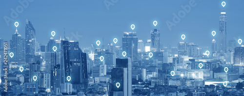 Photography 5G pin icon network connection activity in the modern city skyscraper technology in blue tone illustration concept