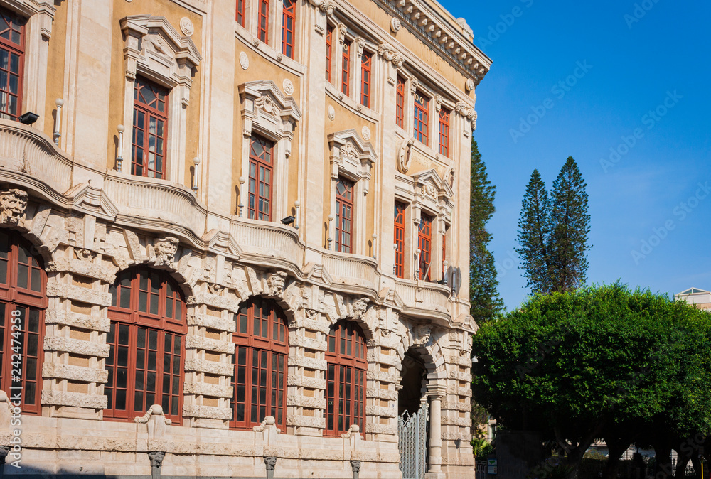 Fototapeta premium Travel to Italy - historical street of Catania, Sicily, facade of ancient buildings.