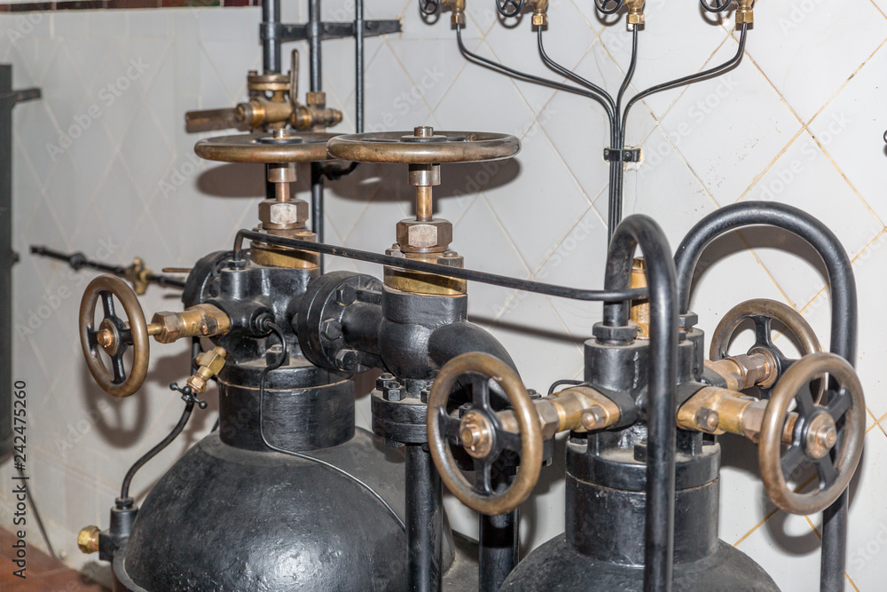 Control valves in an old subway machine room Control valves in an old subway machine room