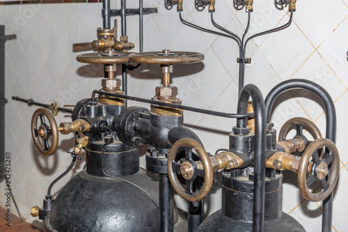 Control valves in an old subway machine room