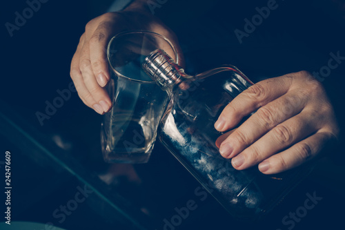 Drunk man on the sofa. Alcoholism, alcohol addiction, drug addic