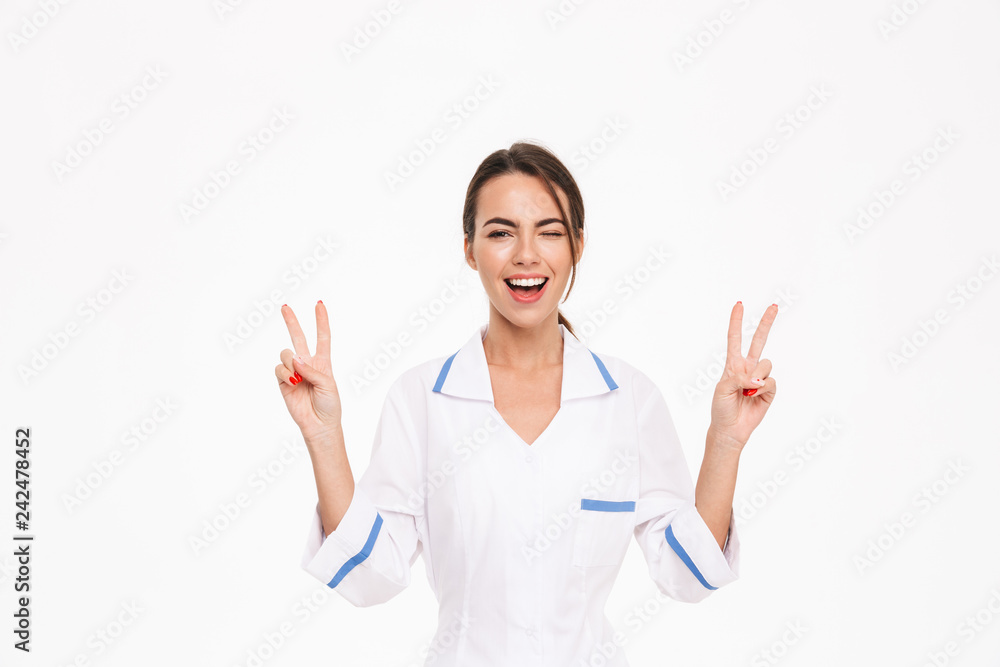 Beautiful young woman doctor wearing uniform Beautiful young woman doctor wearing uniform