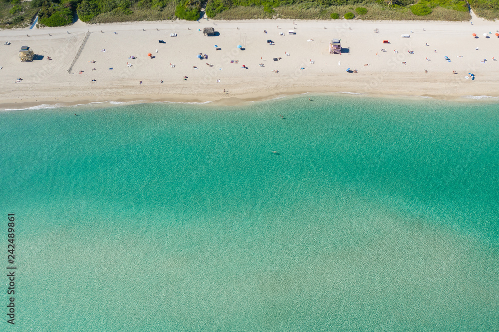 Aerial Miami Beach scenic with clear shallow winter water