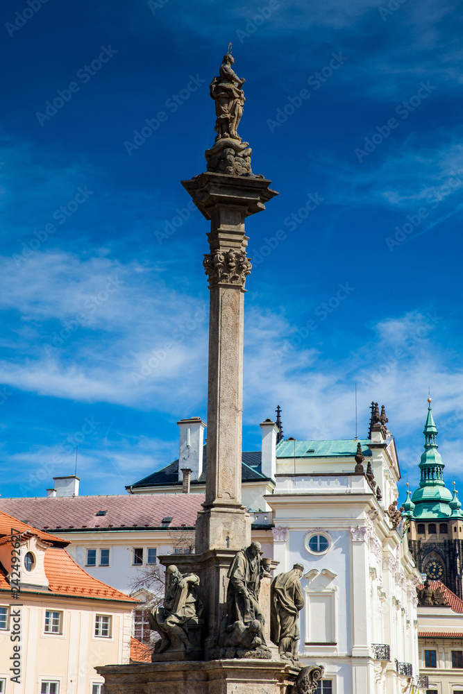Plague column of Virgin Mary built on 1715 at Hradcany Square on the lesser quarter of Prague in a beautiful early spring day