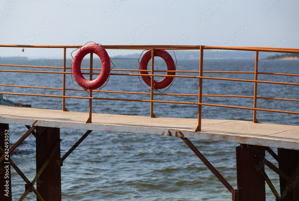 lifebuoys on the sea pier