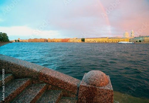 Malaya Neva, Makarova Embankment, in the evening at sunset, with a rainbow on the horizon . Saint-Petersburg. photo