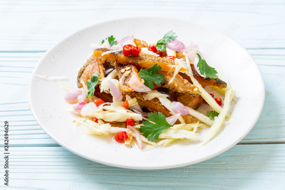 crispy gourami fish with spicy salad