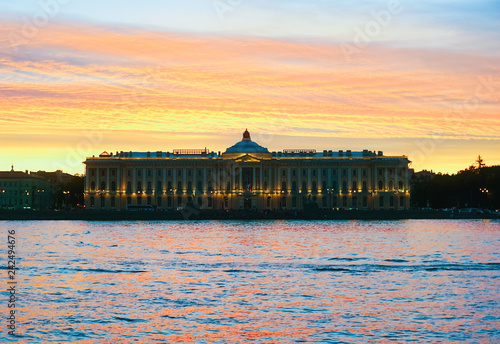 Sunset on Neva, Universitetskaya embankment . Saint-Petersburg. Academy of arts.