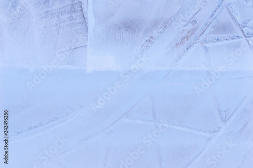 blue ice texture with a pattern and cracks background  ice frozen rink winter background  texture of ice surface for designers   blocks frozen water