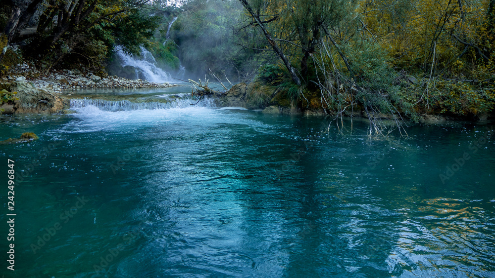 Waterfall and Lake within the colorful Plitvice National Park in Croatia Waterfall and Lake within the colorful Plitvice National Park in Croatia