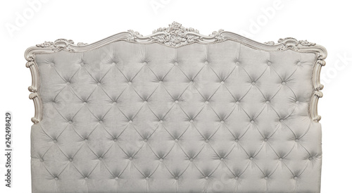 Grey velvet bed headboard isolated on white photo