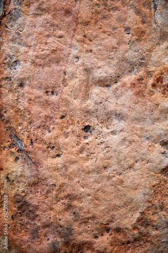 Red rough stone wall