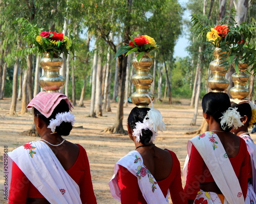 group of dancers in costumes