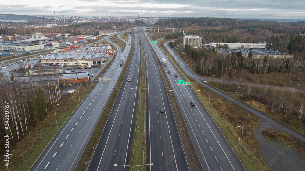 Aerial view of highway.Tampere city on bacground. Finland