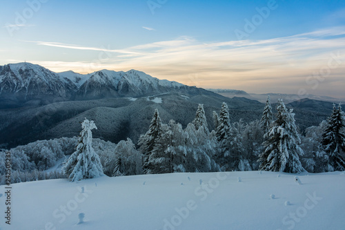 Fantastic winter mountain landscape glowing by sunlight © zane38