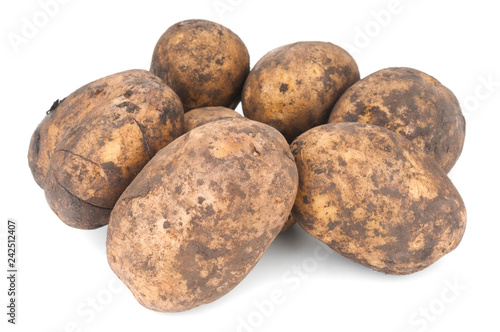 Heap of fresh organic potatoes on white background