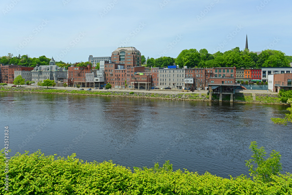 Historic Buildings on the bank of Kennebec River in downtown Augusta, Maine, USA.