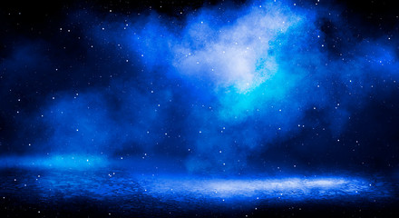 Blue misty dark background. Dark street with smoke, fog, blue spotlights, neon. Dark abstract empty background.