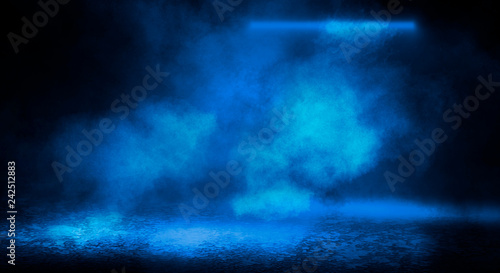 Blue misty dark background. Dark street with smoke  fog  blue spotlights  neon. Dark abstract empty background.