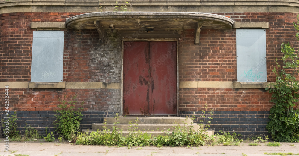 Derelict Art Deco style building doorway Derelict Art Deco style building doorway