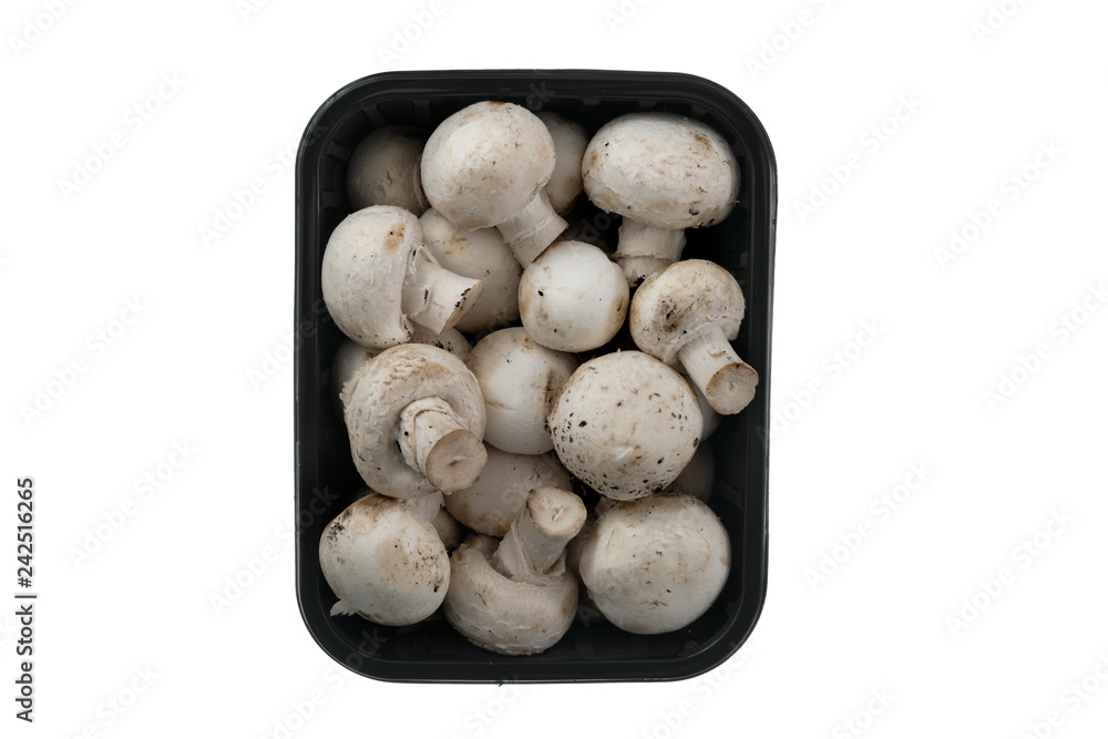 above view of mushrooms in packing isolated on white background