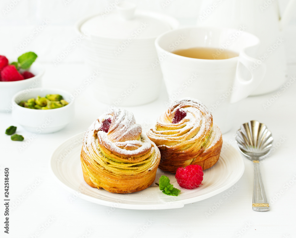 puff pastry with pistachios and raspberries. puff pastry with pistachios and raspberries.