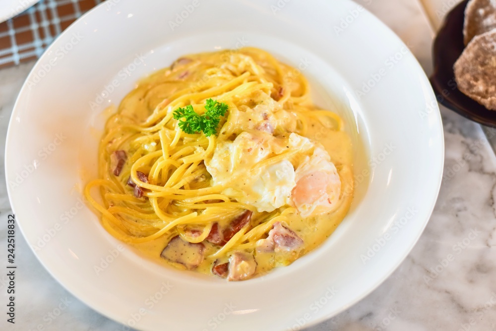 Spaghetti Carbonara with Creamy Sauce and Pouched Egg 