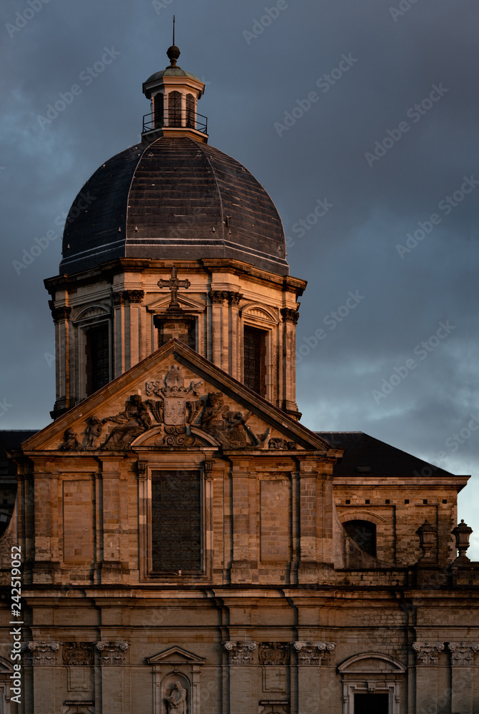 Gent, East Flanders / Belgium - 12 09 2018: Detail of the church of Sait Peter (Sint-Pieterskerk) under a golden sunset light.
