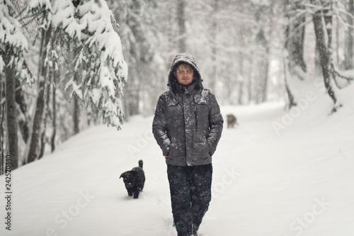traveler hiking trip in the snow when life is better in the woods with dogs