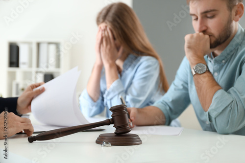Unhappy young couple visiti...