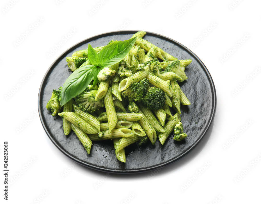 Plate with tasty pesto pasta on white background Plate with tasty pesto pasta on white background