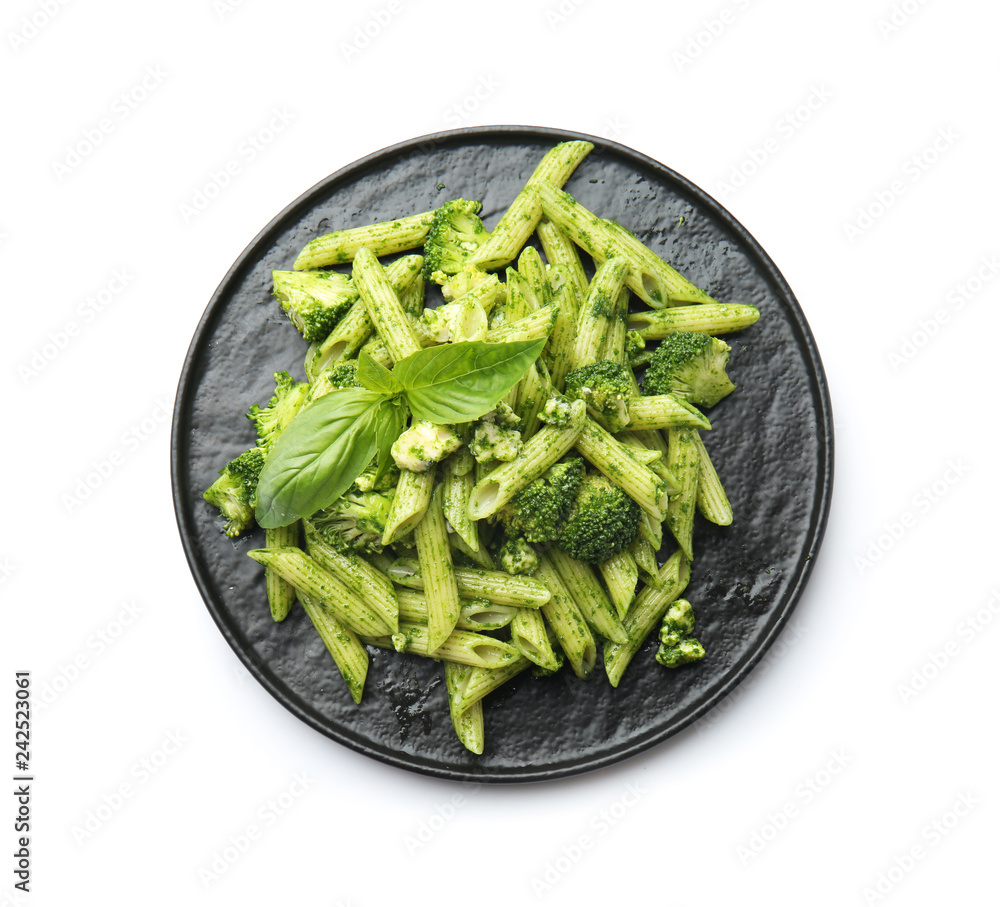 Plate with tasty pesto pasta on white background Plate with tasty pesto pasta on white background
