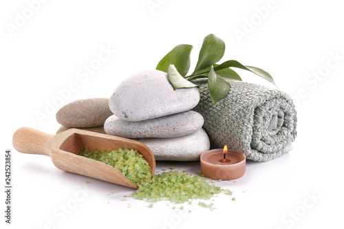 Canvas Print Beautiful spa composition with stones, towel, sea salt and candle on white backg