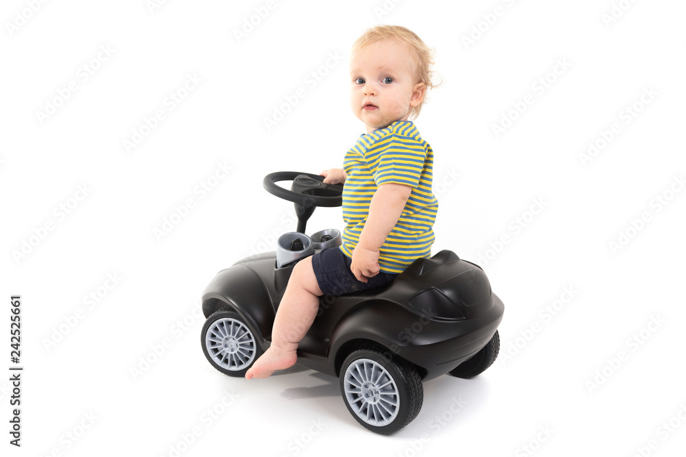 Child sitting on a gurney isolated on white background Child sitting on a gurney isolated on white background