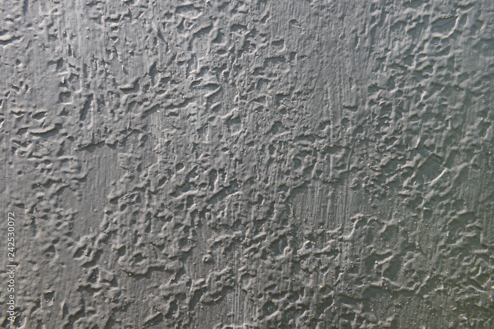 old gray painted surface with bumps and mounds old gray painted surface with bumps and mounds