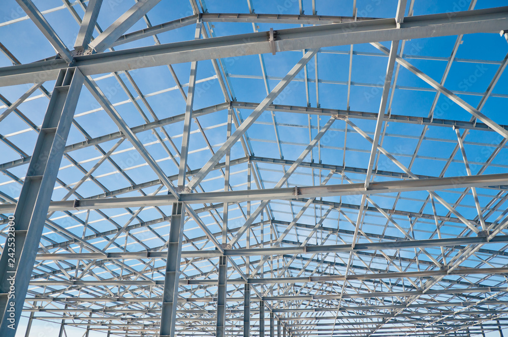 Fototapeta premium Structure of building. Steel construction on sky background