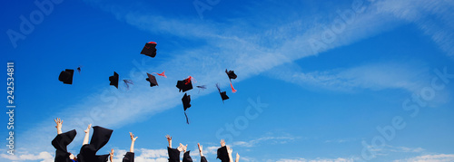 Graduates students in university robes celebrate end of academic year Bachelor and Master programs