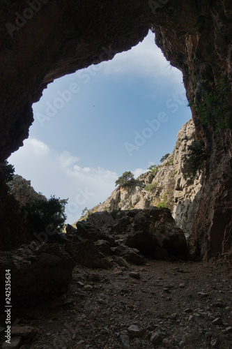 Rock arch on trekking trail at Imbros gorge near Chora Sfakion, island of Crete, Greece © banepetkovic